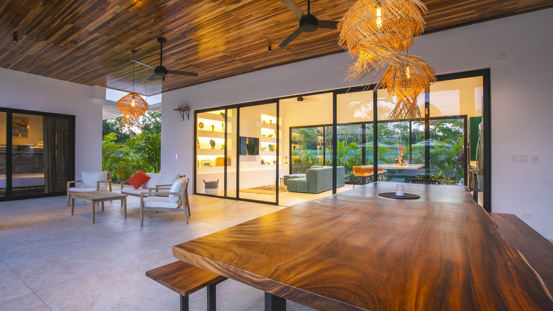 Open-plan living and dining at Villa Amara with views to the garden